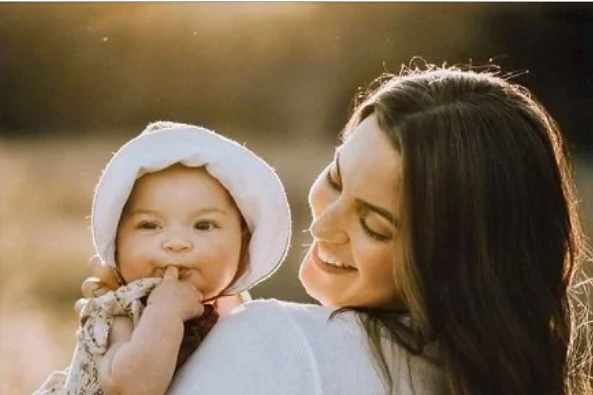 Woman holding her baby