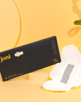 Bamboo incontinence pads by joni, with a sleek packaging and pad displayed on a yellow background.