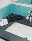 Bamboo incontinence pads by joni displayed on bathroom countertop next to a sink, highlighting absorbent and plant-based design.