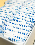 open bulk box of joni super pads
