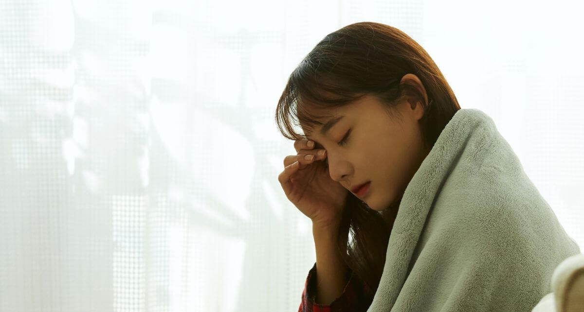 Woman looking upset during her period