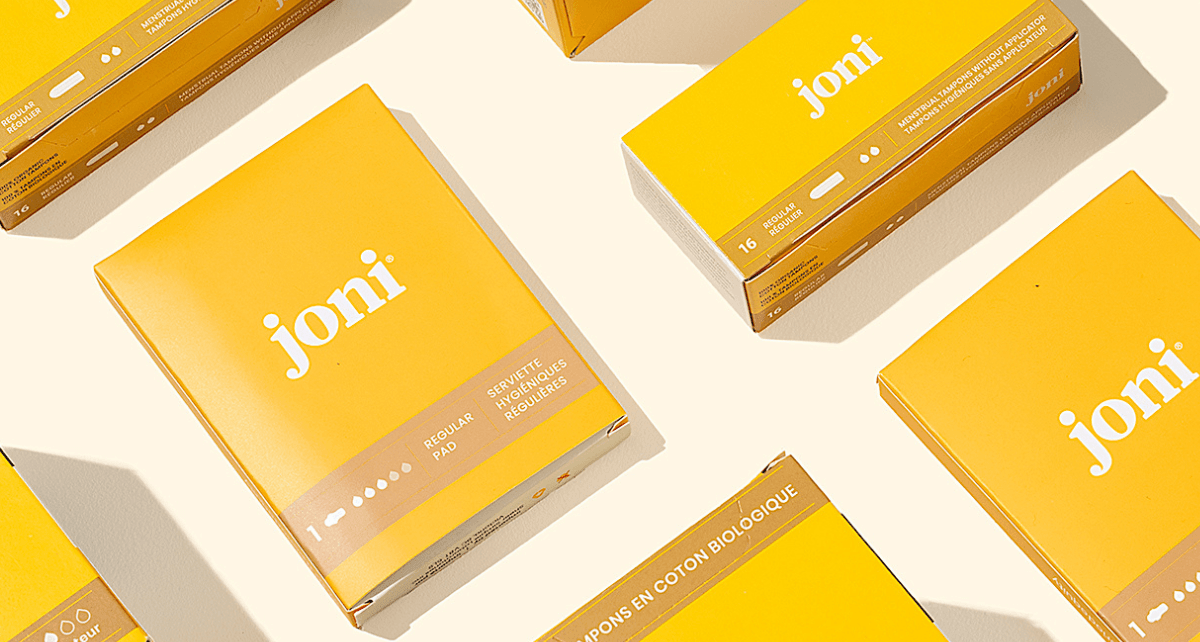 Packaging of joni period care products in yellow boxes, relevant to Manitoba period care mandates 2026.