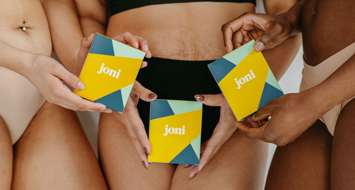 Three woman in underwear hold joni period care