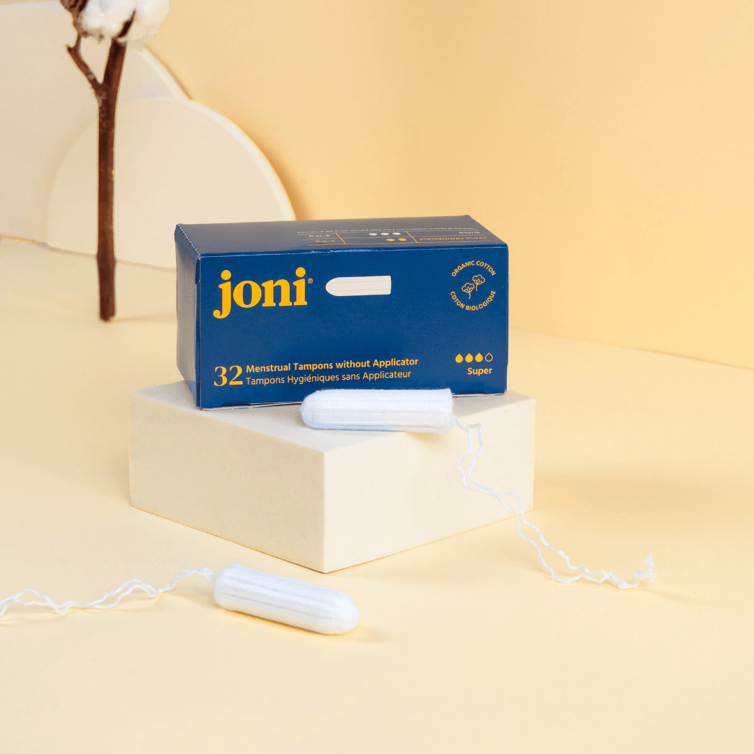 joni super tampons with packaging on a beige background